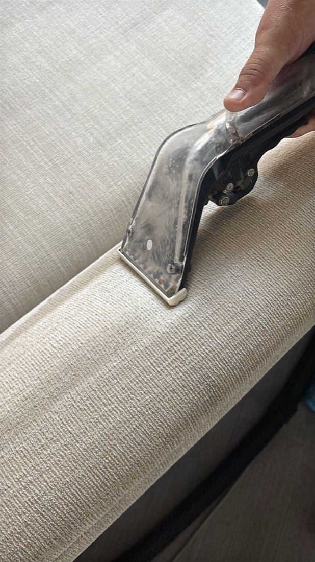 Cream sofa arm, mid-clean