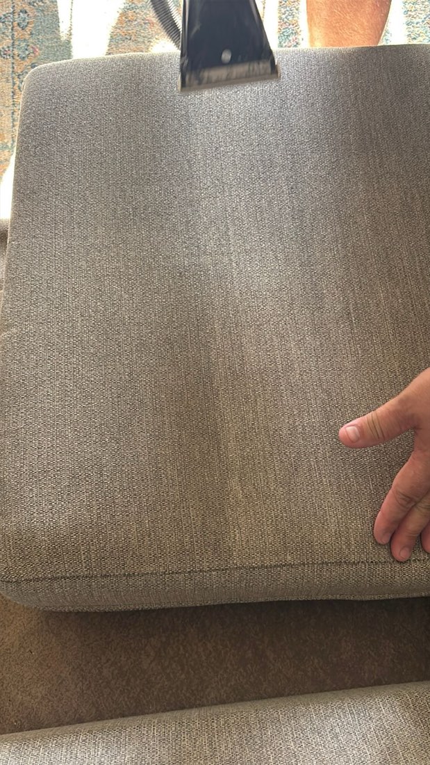Grey sofa cushion, cleaned strip down the middle