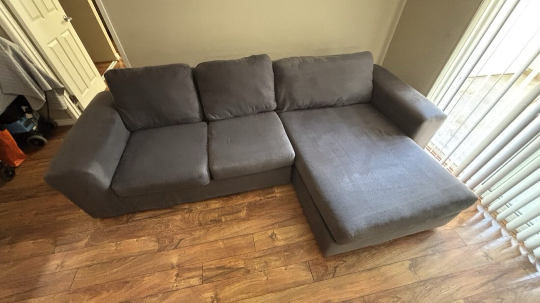 Grey sectional sofa after deep cleaning